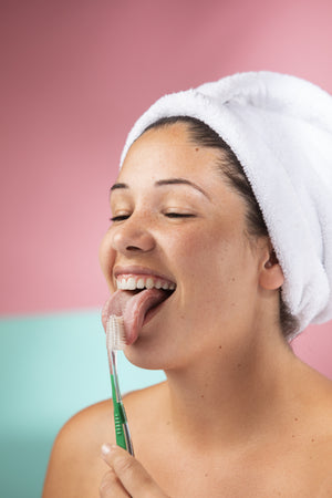 7 Reasons to Use a Tongue Scraper and Our Top Picks