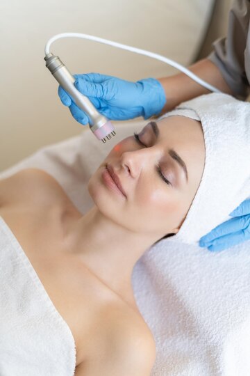 Microdermabrasion is a non-invasive technique for skin rejuvenation that exfoliates and removes the dead, dry skin cells from the face using small crystals or diamond-tipped wands. 