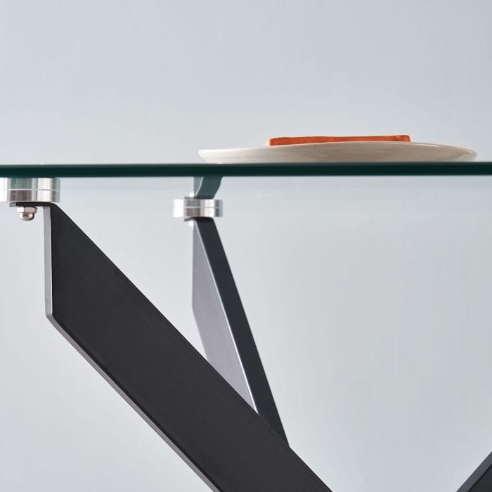 Table à manger en verre rectangulaire de 150 cm - Amara avec des jambes transversales en métal noir